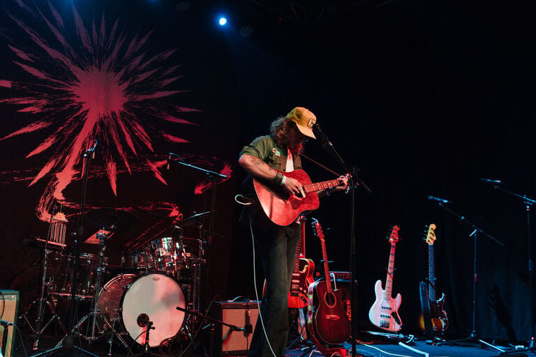 Mills performing on stage