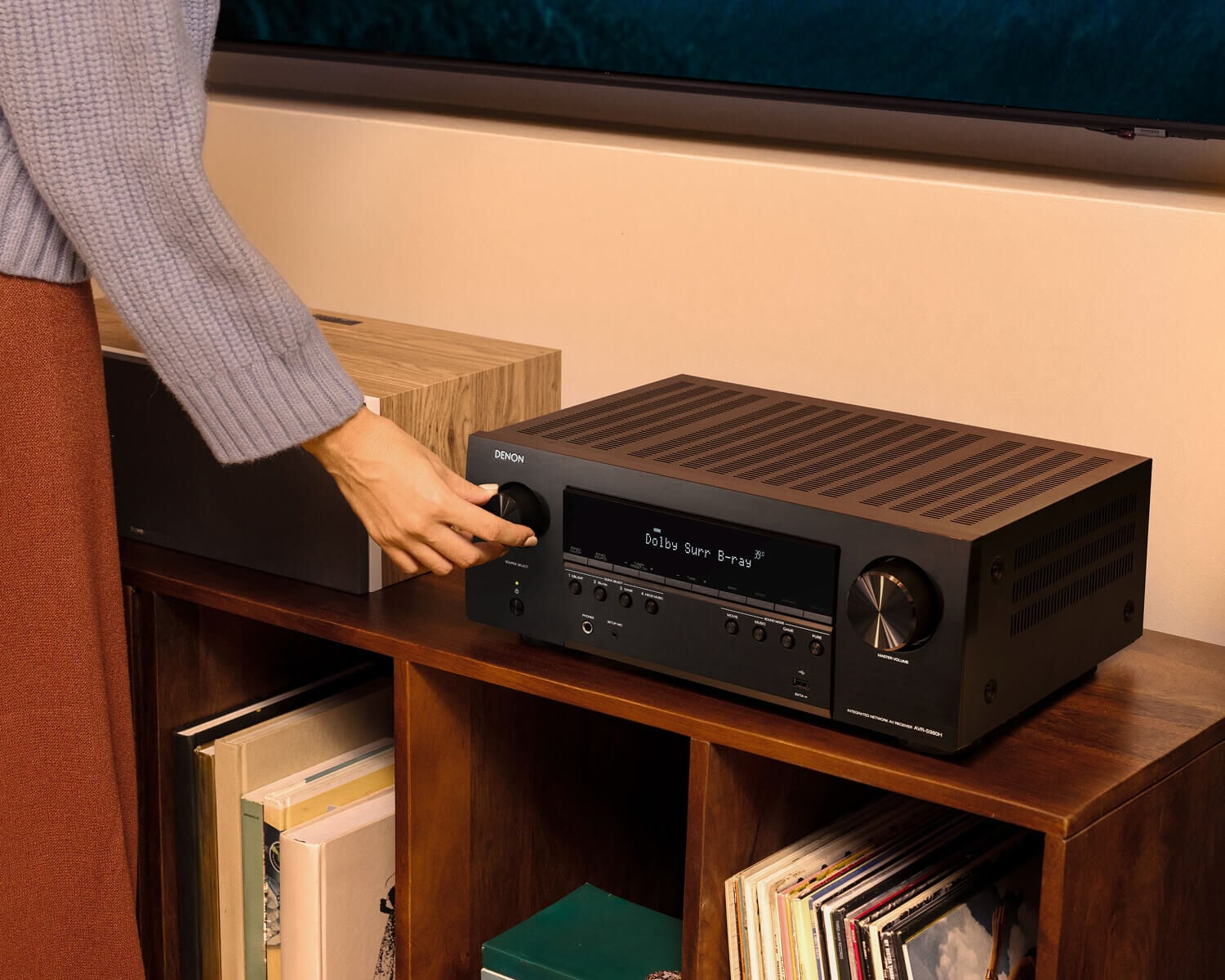 adjusting the volume on an AVR