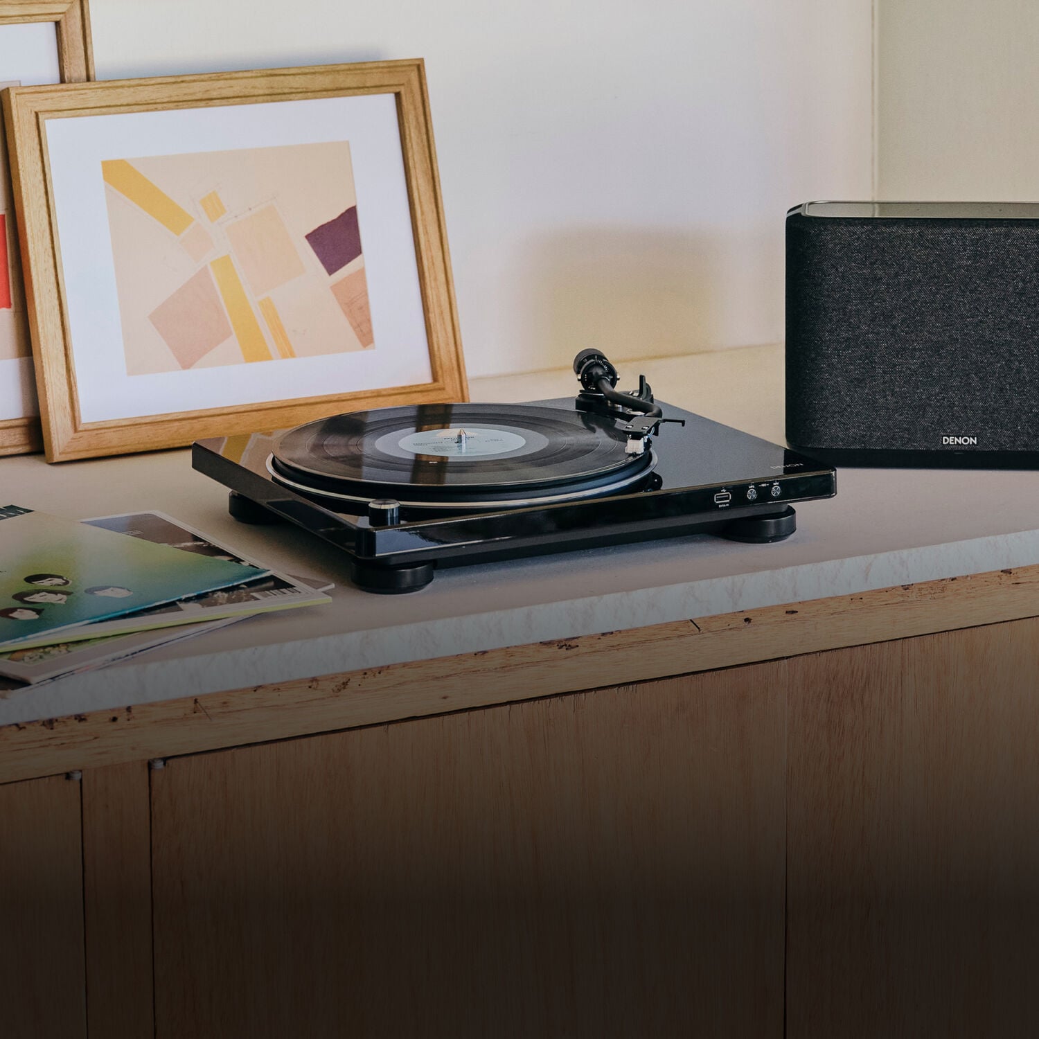turntable and speaker on a counter