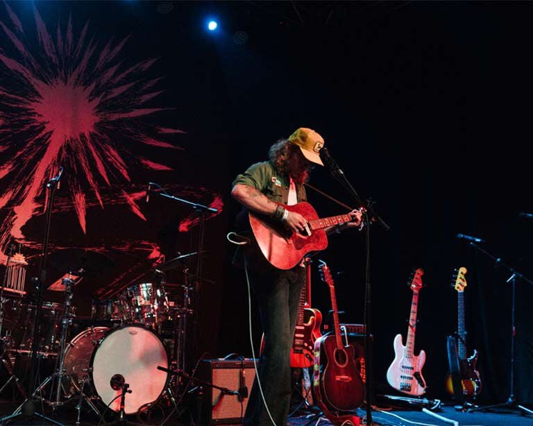 Mills performing on stage