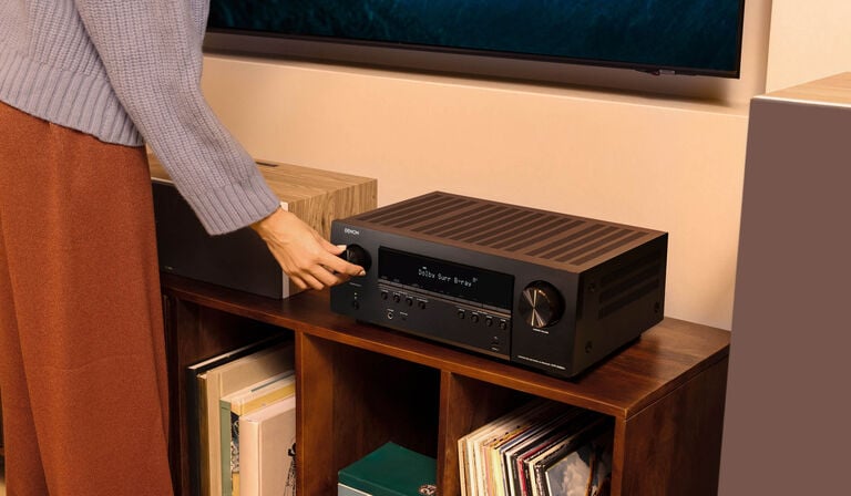 adjusting the volume on an AVR