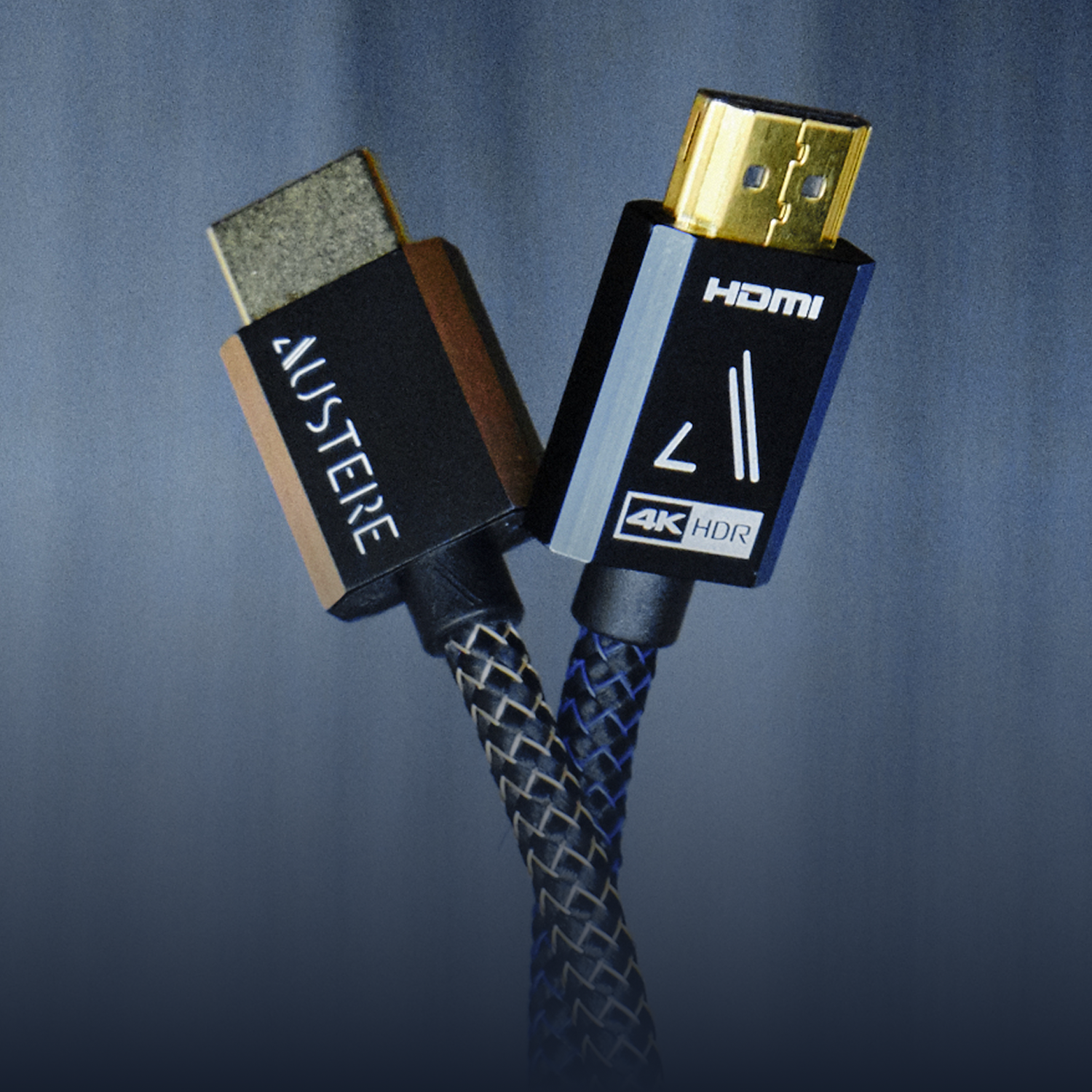 Austere Cables twisting together on a blue background