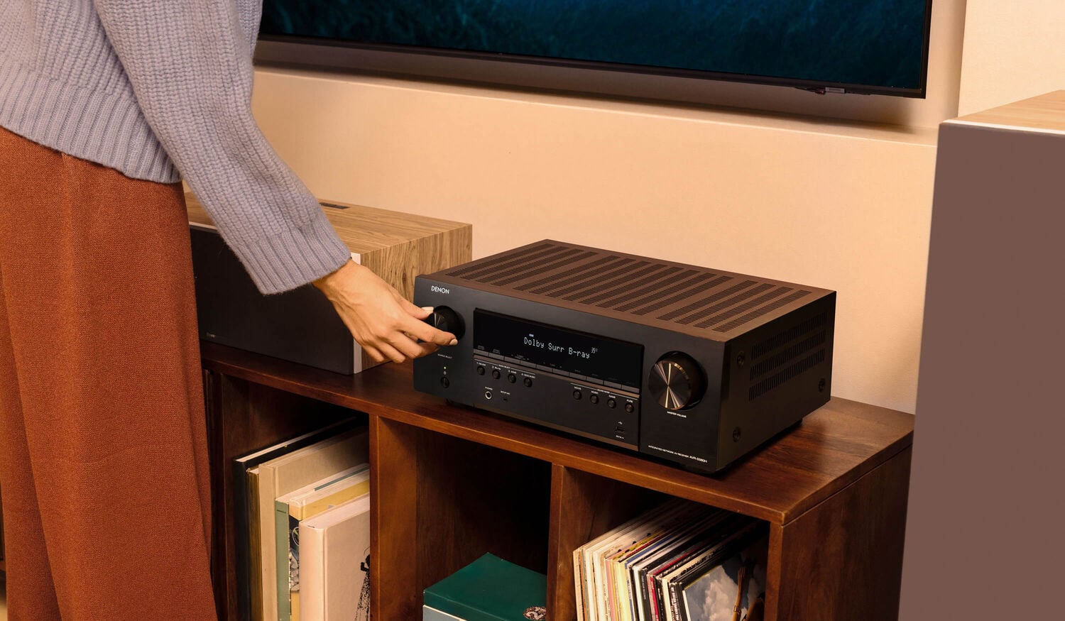 adjusting the volume on an AVR