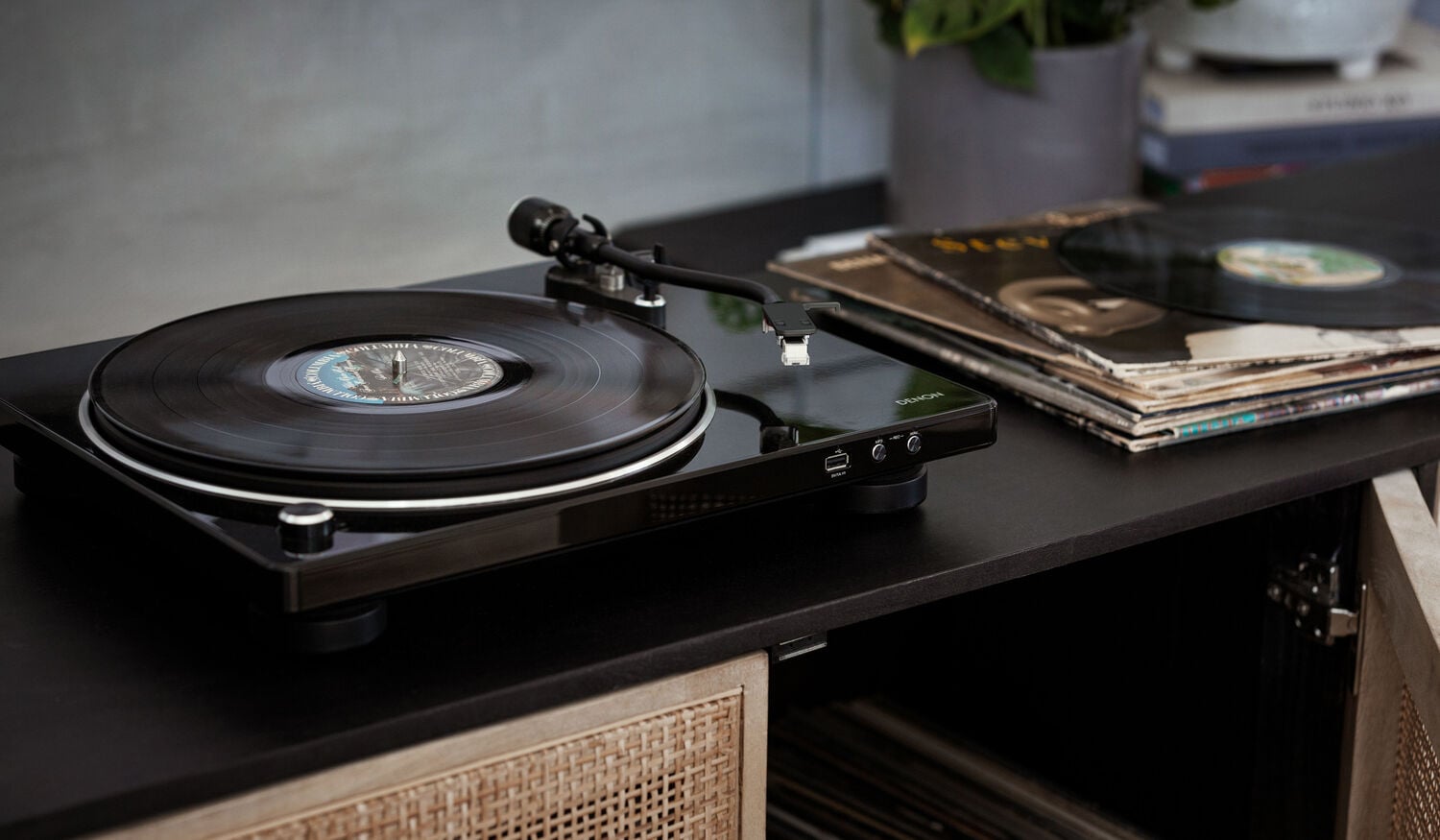 A vinyl record player on a table