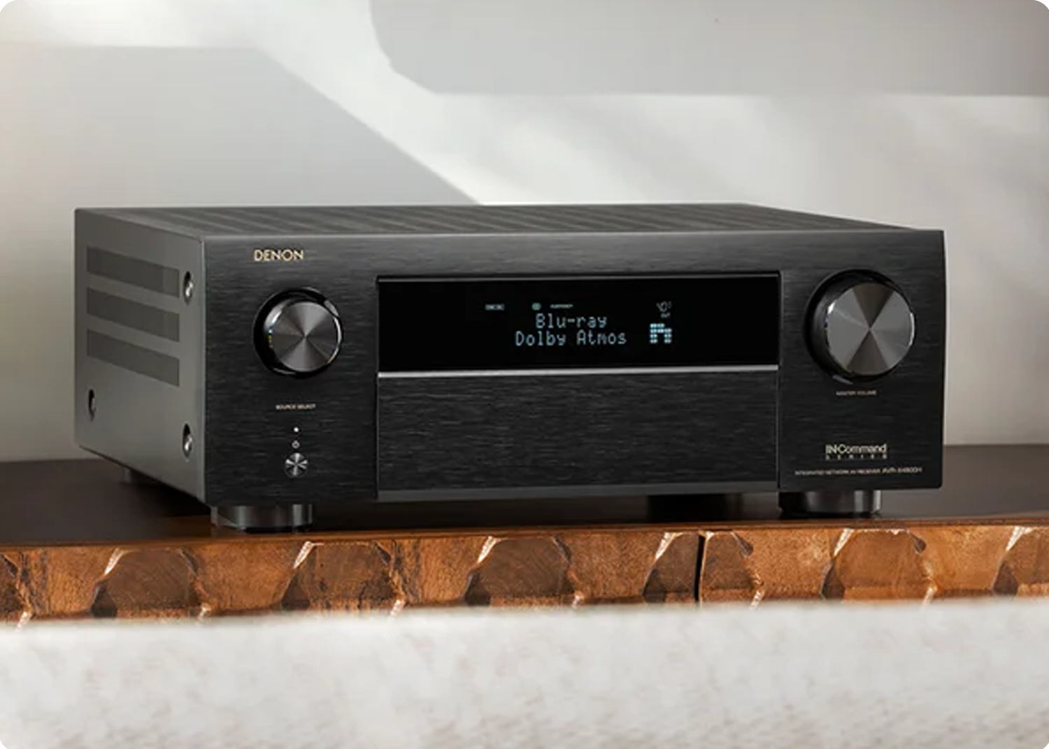 AVR-X4800H on a dresser displaying Blue Ray and Dolby Atmos