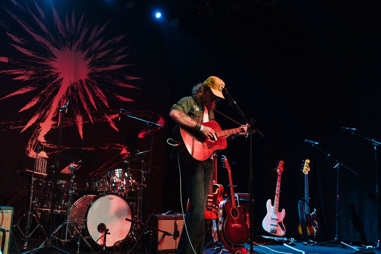 Mills performing on stage