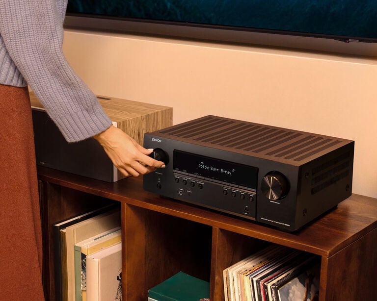 adjusting the volume on an AVR