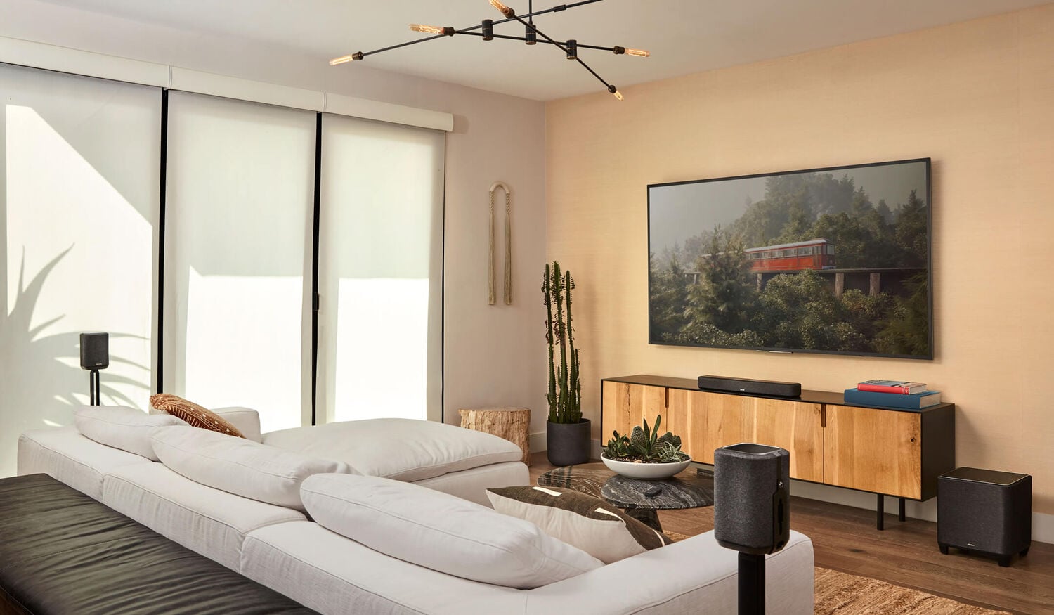 A living room with a home theater set up