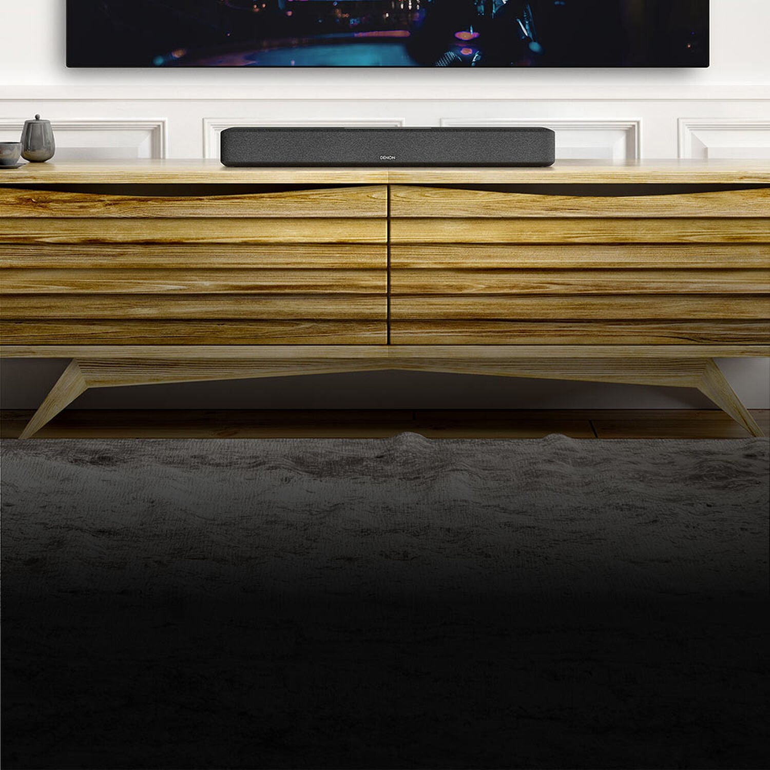 A soundbar under a TV