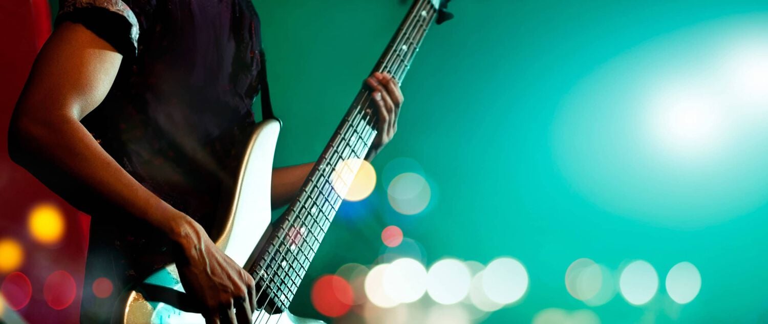 A man playing a guitar